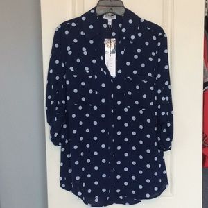 Blue button-down blouse with light blue polka dots